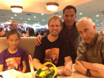 Geoff and his daughter, Sami, eating dinner with Steve and Oscar